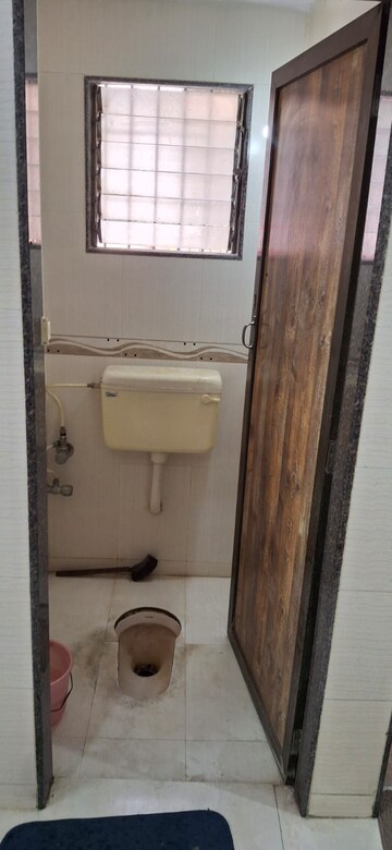 Bathroom in 1 RK Apartment at Nagari Niwara CHS, Goregaon East – for Rent