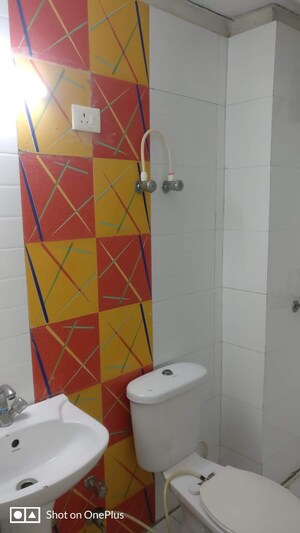 Bathroom in 3 BHK Apartment at Gulmohur Garden, Raj Nagar Extension – for Rent