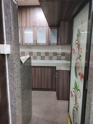 Kitchen in 2 BHK Apartment at Nilgiri C Wing CHS, Andheri East – for Rent