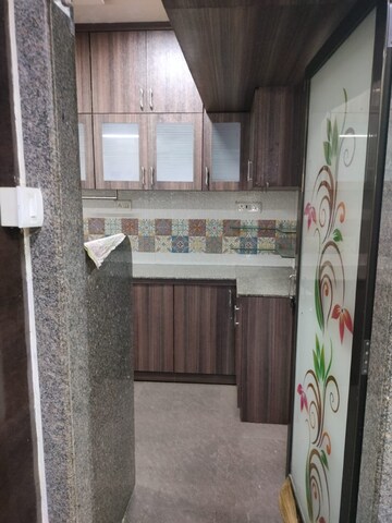 Kitchen in 2 BHK Apartment at Nilgiri C Wing CHS, Andheri East – for Rent