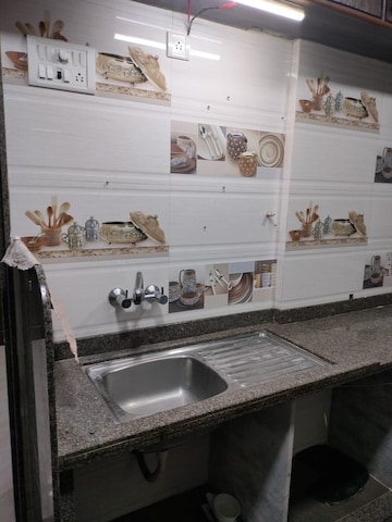 Kitchen in 2 BHK Apartment at Nilgiri C Wing CHS, Andheri East – for Rent