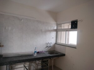 Kitchen in 1 BHK Apartment at Parklane Lifeseasons, Dhanori – for Rent
