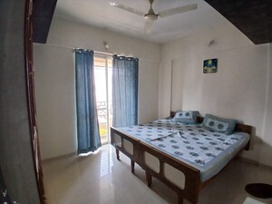 Bedroom in 2 BHK Apartment at Radhika Park, Wadgaon Sheri – for Rent
