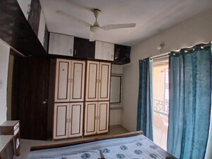 Bedroom in 2 BHK Apartment at Radhika Park, Wadgaon Sheri – for Rent