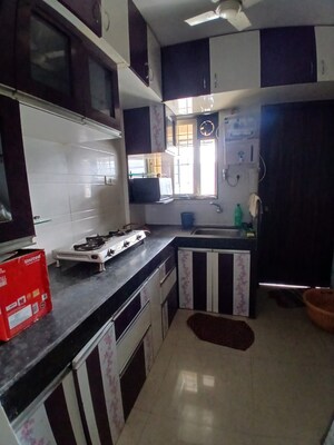 Kitchen in 2 BHK Apartment at Radhika Park, Wadgaon Sheri – for Rent