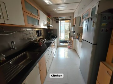 Kitchen in 3 BHK Apartment at Starwing Katyayni Residency, Andheri East – for Rent
