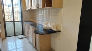 Kitchen in 2 BHK Apartment at Lake Pleasant, Powai – for Sale