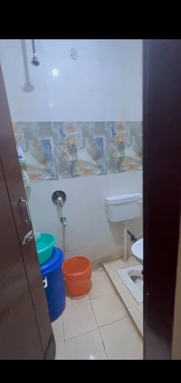 Bathroom in 3 BHK Builder Floor at Mahavir Enclave – for Sale