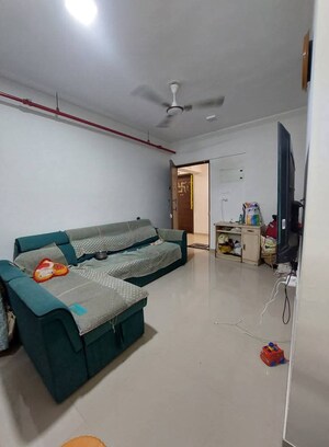 Living Room in 1 BHK Apartment at JP North Aviva, Mira Road – for Sale
