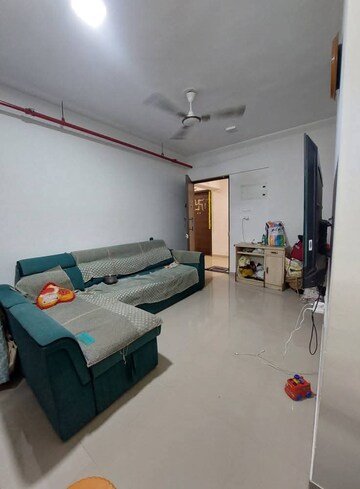 Living Room in 1 BHK Apartment at JP North Aviva, Mira Road – for Sale
