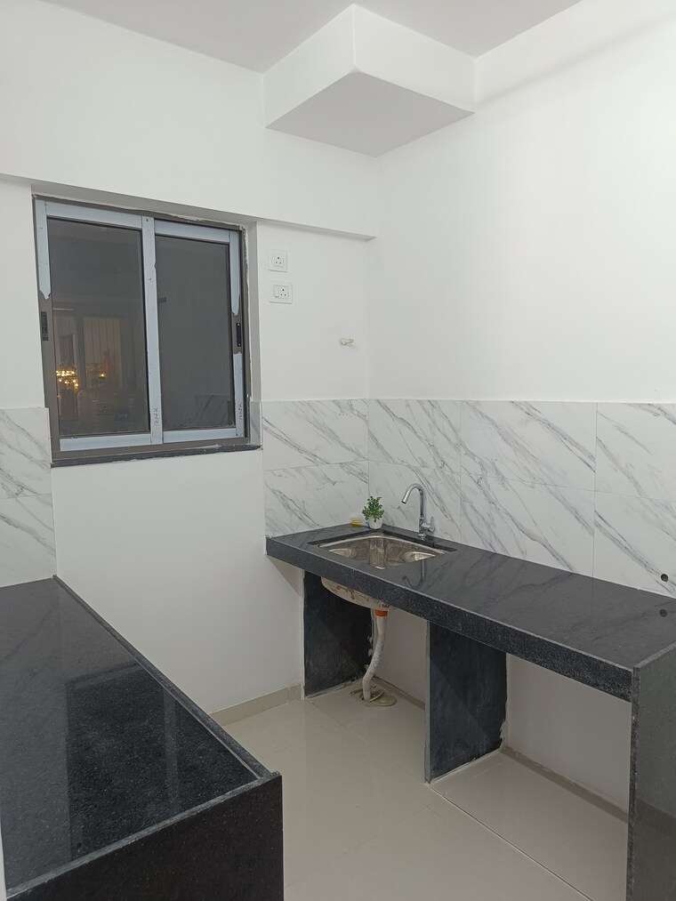 Kitchen, uk-iridium 1 Bedroom 410 Sq.Ft. Apartment In Kandivali East Mumbai 9589226
