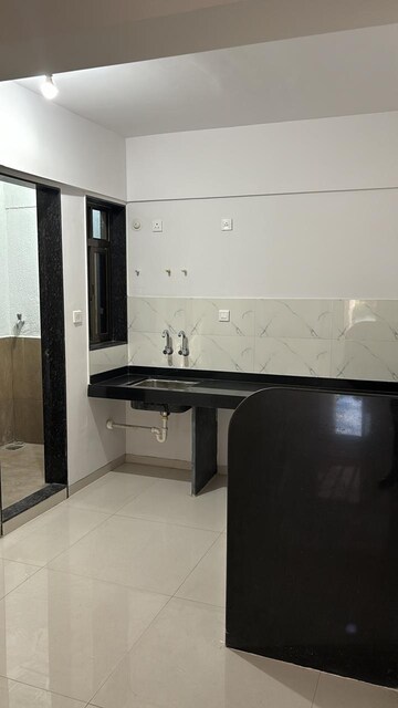 Kitchen in 2 BHK Apartment at Wadgaon Sheri – for Sale