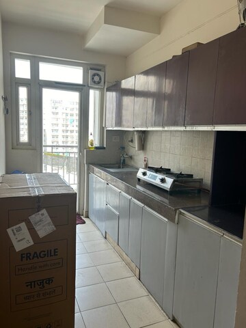 Kitchen in 2 BHK Apartment at RAS Palm Residency, Sector 76 – for Rent