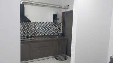 Kitchen in 3 BHK Apartment at Wadgaon Sheri – for Sale