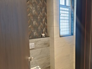 Bathroom in 1 BHK Apartment at Orange County Gathagram, Dehu – for Sale