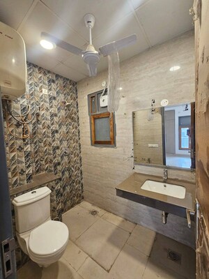 Living Room in 1.5 BHK Builder Floor at Novus Tower, Sector 18 – for Rent