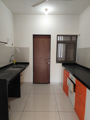 Kitchen in 2 BHK Apartment at Bhugaon – for Sale