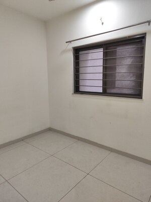 Room in 2 BHK Apartment at Bhugaon – for Sale