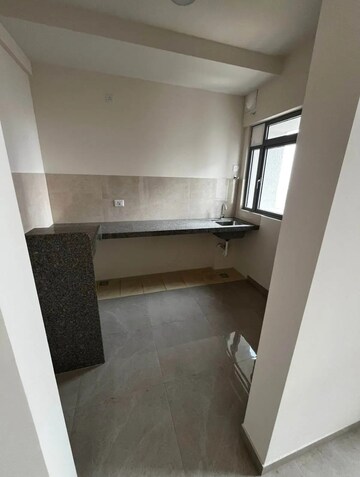 Kitchen in 2 BHK Apartment at Piramal Vaikunth, Balkum Pada – for Rent