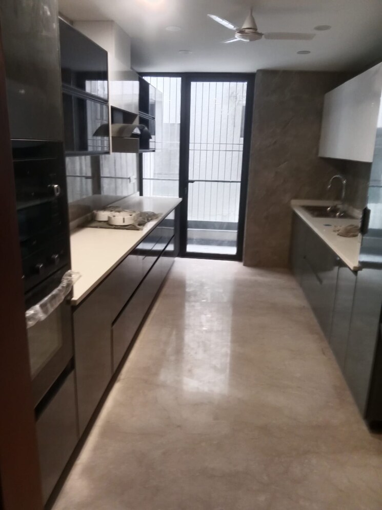 Kitchen, anand lok 4 Bedroom 400 Sq.Yd. Builder Floor In Anand Lok Delhi 9589584