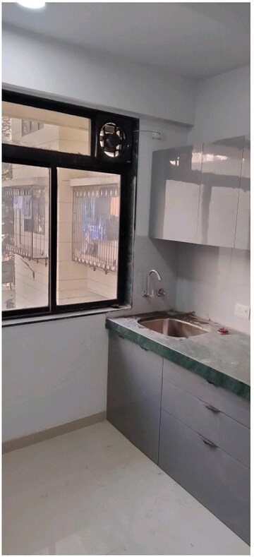 Kitchen in 1 BHK Apartment at Siddhi Highland Springs, Dhokali – for Rent