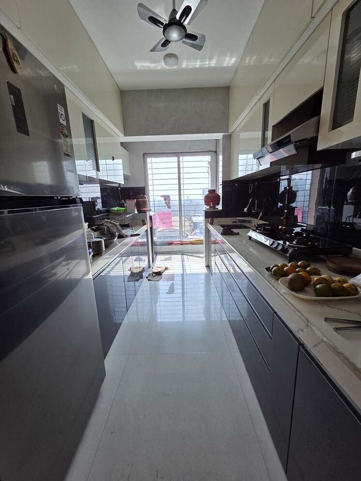 Kitchen, cosmos-habitat 2 Bedroom 701 Sq.Ft. Apartment In Majiwada Thane 9589665