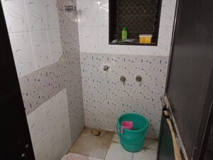 Bathroom in 1 BHK Apartment at Malad SC CHS, Malad West – for Sale