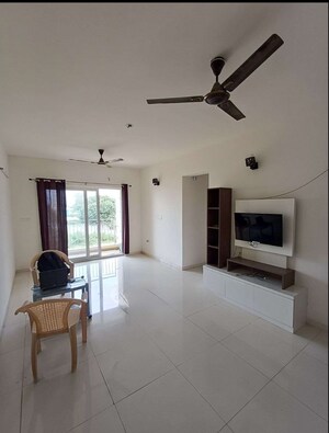 Living Room in 2 BHK Apartment at Casagrand Lorenza, Kogilu – for Rent