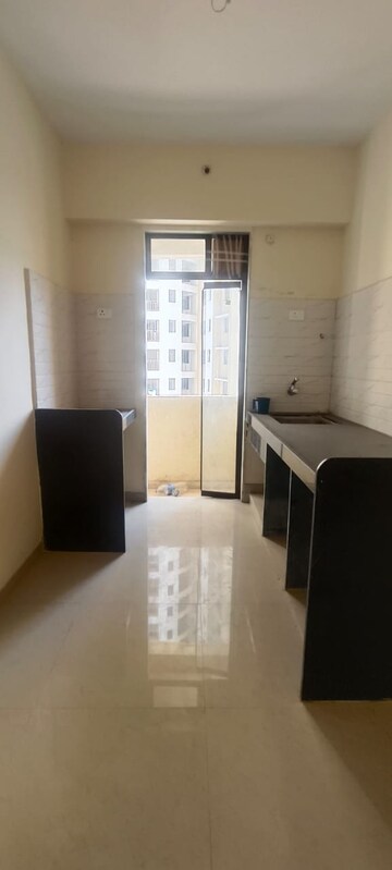 Kitchen in 2 BHK Apartment at Shanti Dham Heights, Parsik – for Rent