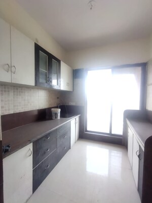 Kitchen in 3 BHK Apartment at Millennium Avanish Phase I, Sector 10a Airoli – for Sale
