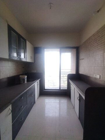 Kitchen in 3 BHK Apartment at Millennium Avanish Phase I, Sector 10a Airoli – for Sale