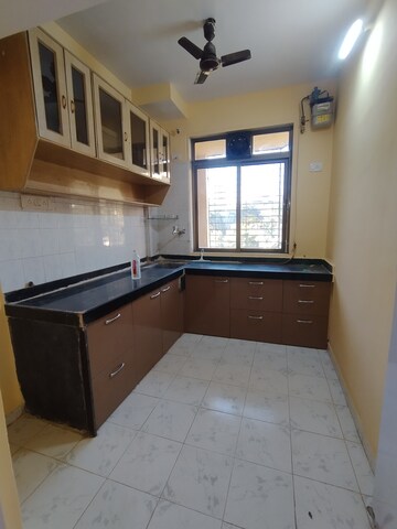 Kitchen in 1 BHK Apartment at Vasant Leela Apartment, Ghodbunder Road – for Rent