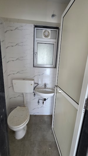 Bathroom in 1 BHK Apartment at White Flower Residency, Kamathipura – for Sale