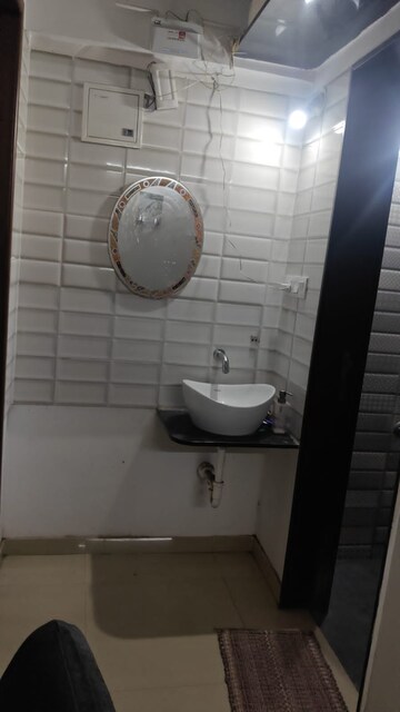 Bathroom in 1 BHK Builder Floor at Millennium Manor, Chikhali – for Sale