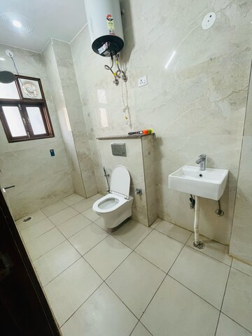 Bathroom in 3 BHK Builder Floor at Shri Balaji Apartments Gurgaon, Dharam Colony – for Rent