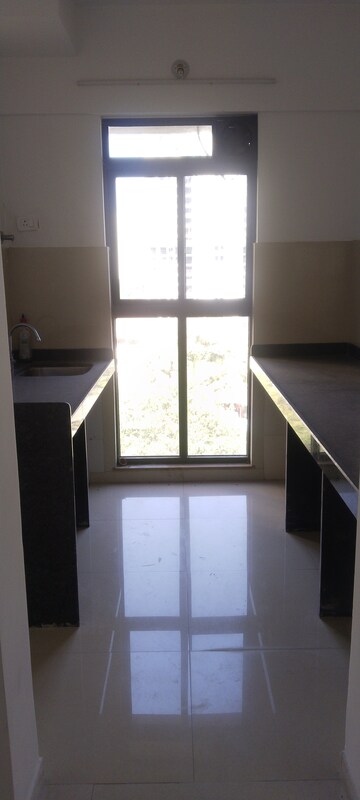 Kitchen in 1 BHK Apartment at Lodha Palava Downtown, Dombivli East – for Rent