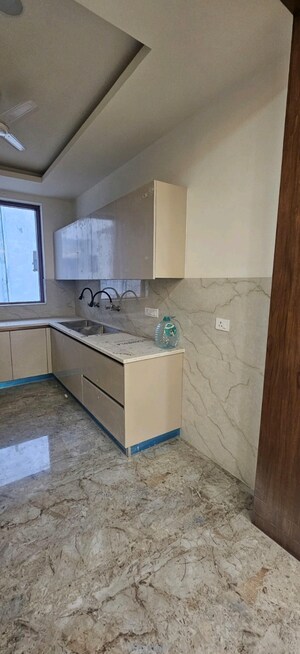 Kitchen in 4 BHK Builder Floor at The Sangam CHS, Sector 21d – for Rent