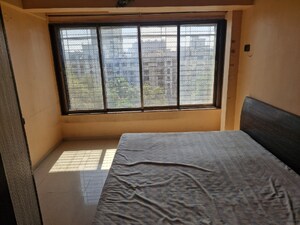 Bedroom in 2 BHK Apartment at Dahisar East – for Rent