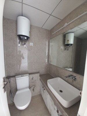 Bathroom in 3 BHK Apartment at Eldeco Live By The Greens, Sector 150 – for Rent