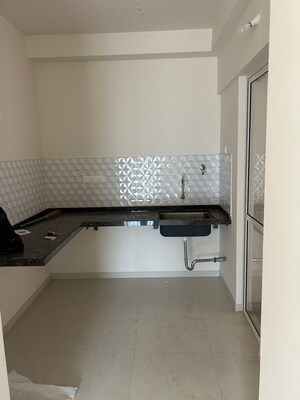 Kitchen in 2 BHK Apartment at Godrej Green Cove, Mahalunge – for Rent