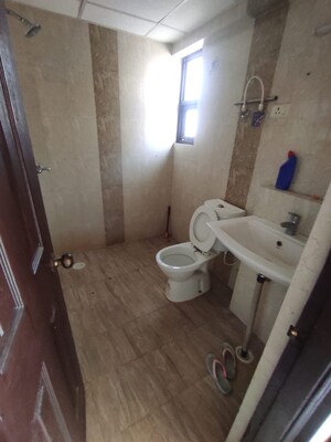 Bathroom in 3 BHK Apartment at Charms Castle, Raj Nagar Extension – for Rent