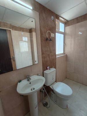 Bathroom in 4 BHK Apartment at Satya The Hermitage, Sector 103 – for Rent