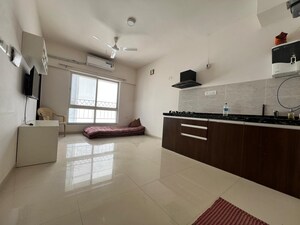 Kitchen in Studio Apartment at Gera World of Joy, Kharadi – for Rent