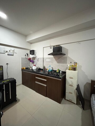 Kitchen in Studio Apartment at Gera World of Joy, Kharadi – for Rent