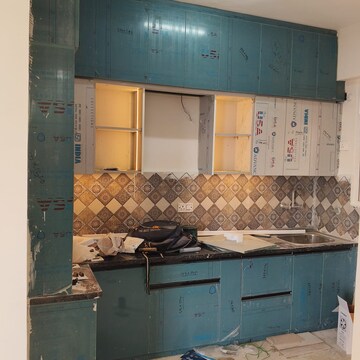 Kitchen in 2 BHK Apartment at Signature The Millennia 3, Sector 37d – for Rent