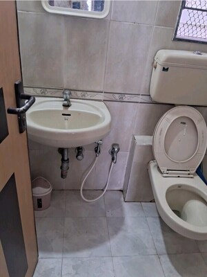 Bathroom in 2 BHK Apartment at Hubtown Akruti Orchid Park, Sakinaka – for Rent
