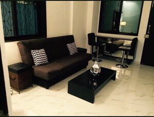 Living Room in 1 BHK Apartment at Vishamber Niwas CHS, Khar West – for Rent
