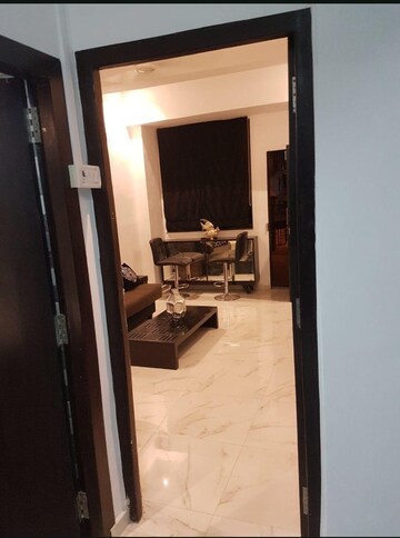 Living Room in 1 BHK Apartment at Vishamber Niwas CHS, Khar West – for Rent