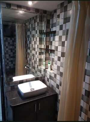 Bathroom in 1 BHK Apartment at Vishamber Niwas CHS, Khar West – for Rent
