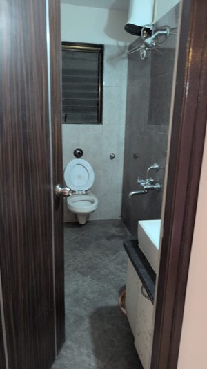 Bathroom in 2 BHK Apartment at Sudarshan Sky Garden, Ghodbunder Road – for Rent